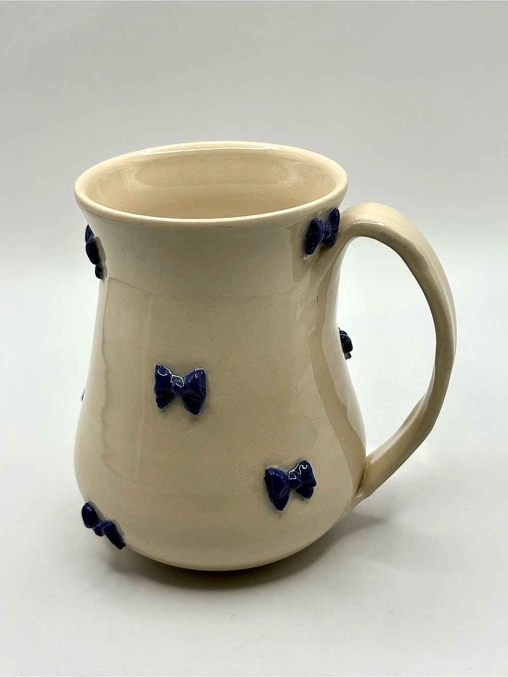 Handcrafted Studio 648 Pottery Bow Mug Ceramic Cream & Blue Bows 16 ozs Canadian